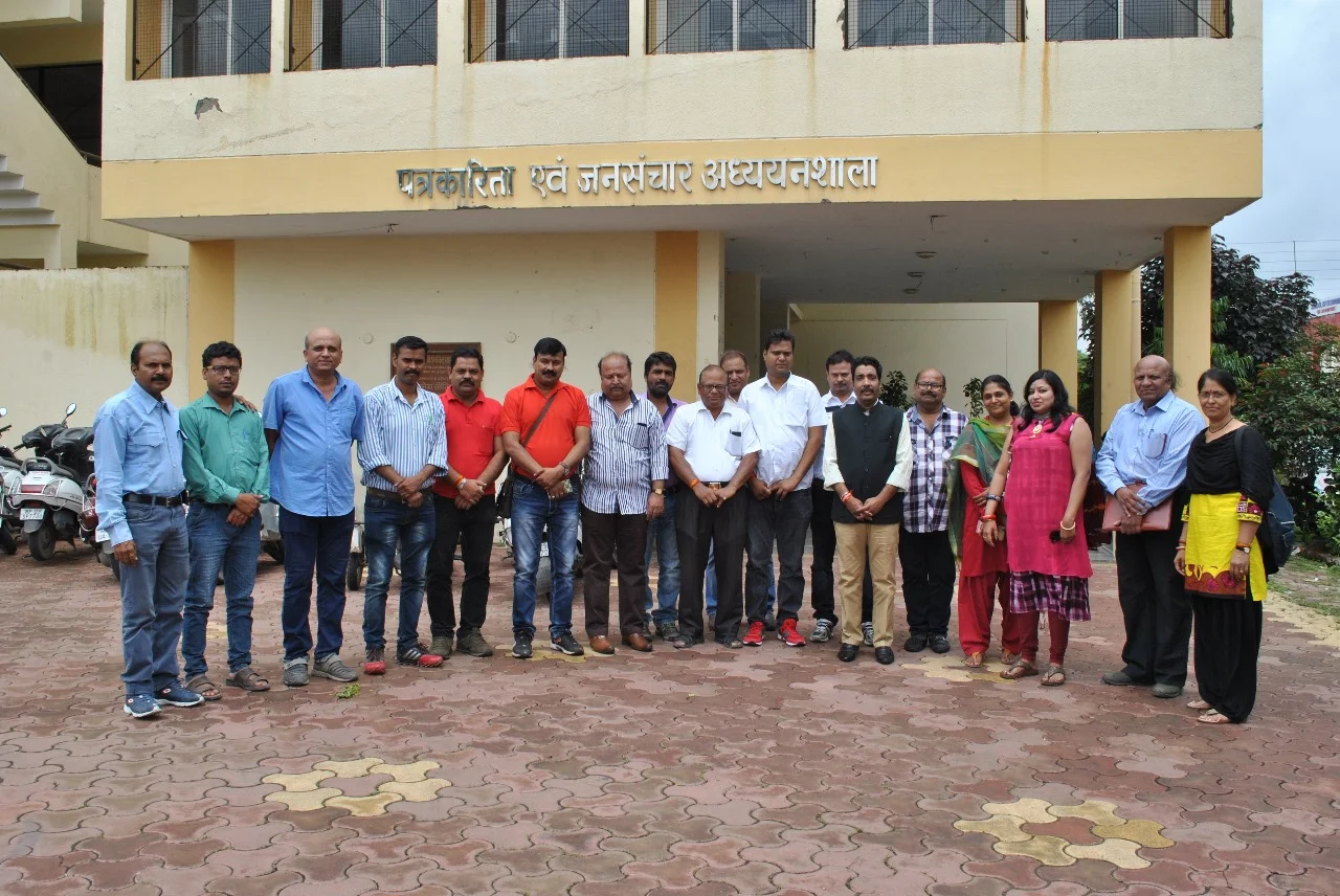 Students at the SJMC front gate